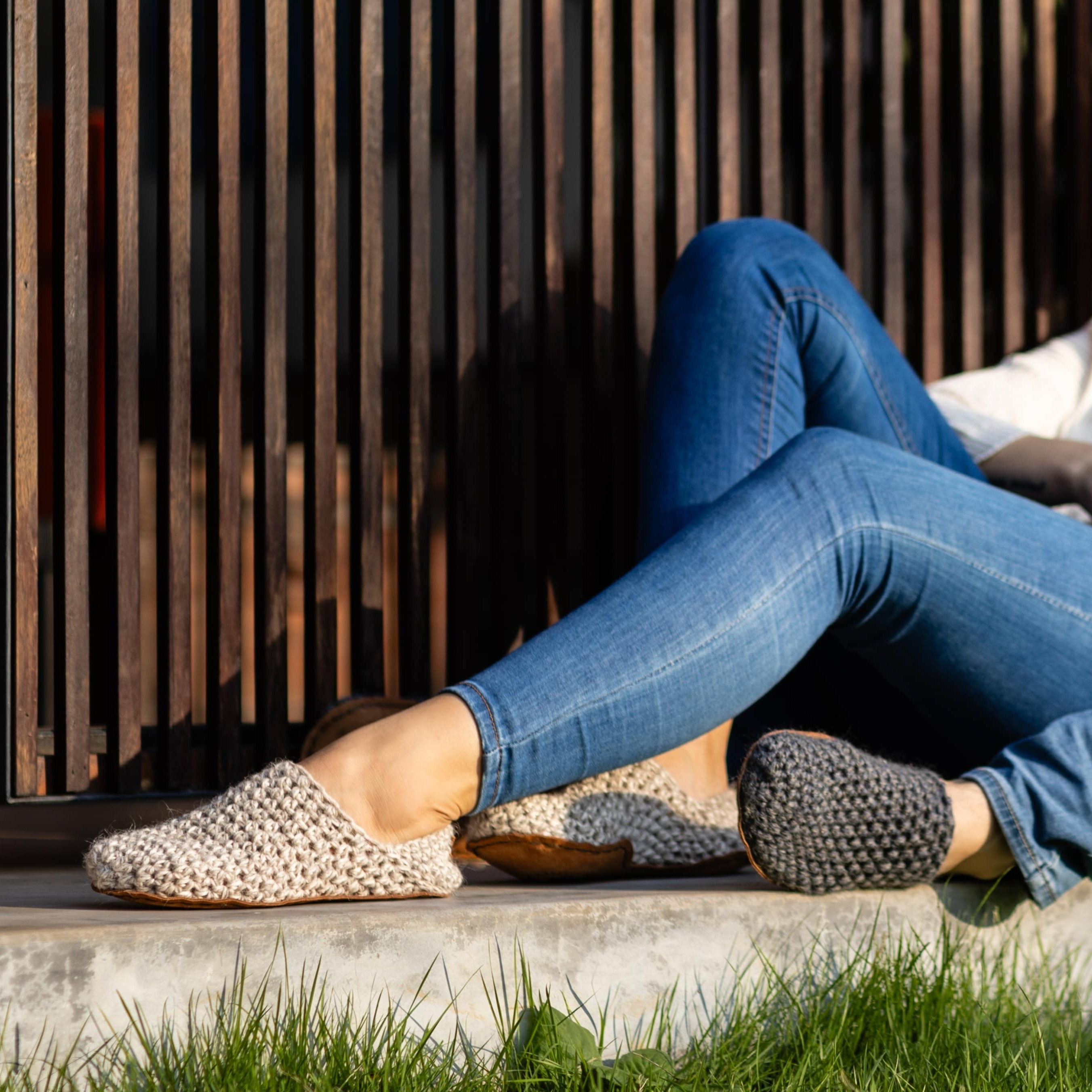 Couple lying with Chai and Charcoal Gray Summer Light Slippers