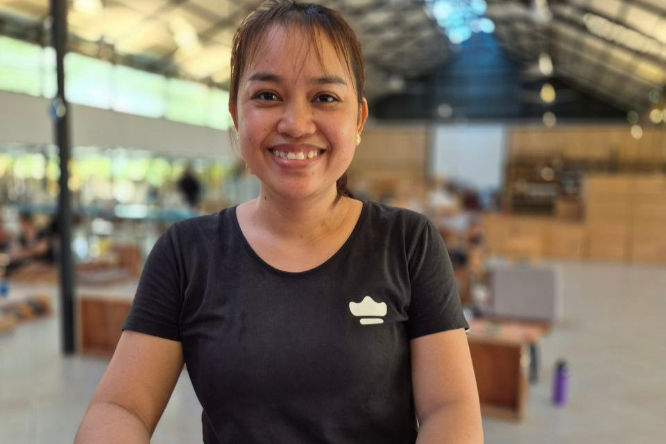 Kingdom of Wow Employee in the workshop, Smiling