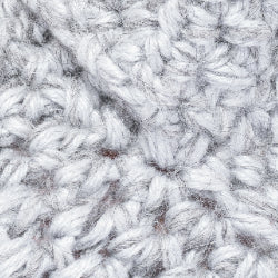 Close-up of textured light grey fabric