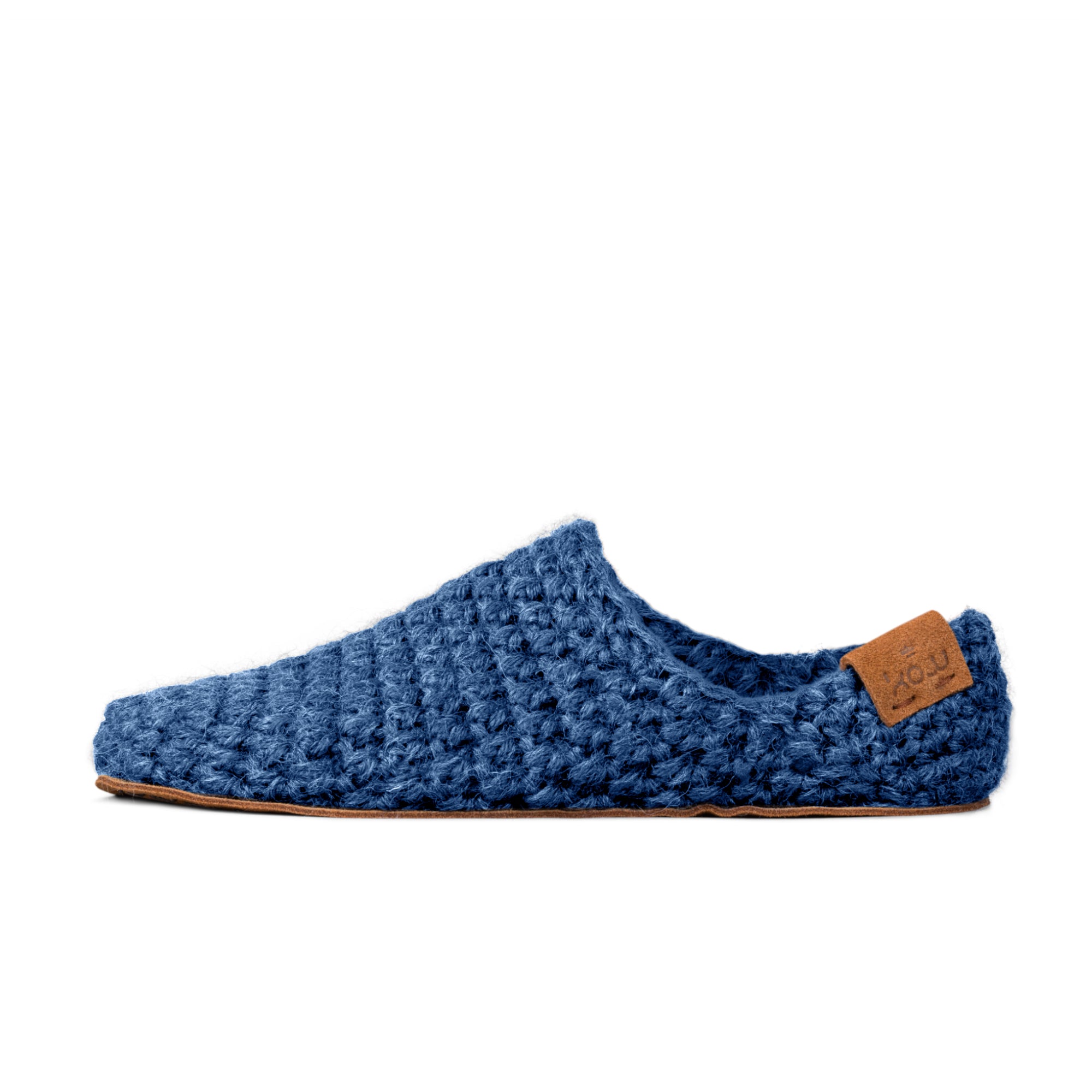 Blue knitted slipper with a leather sole on a white background