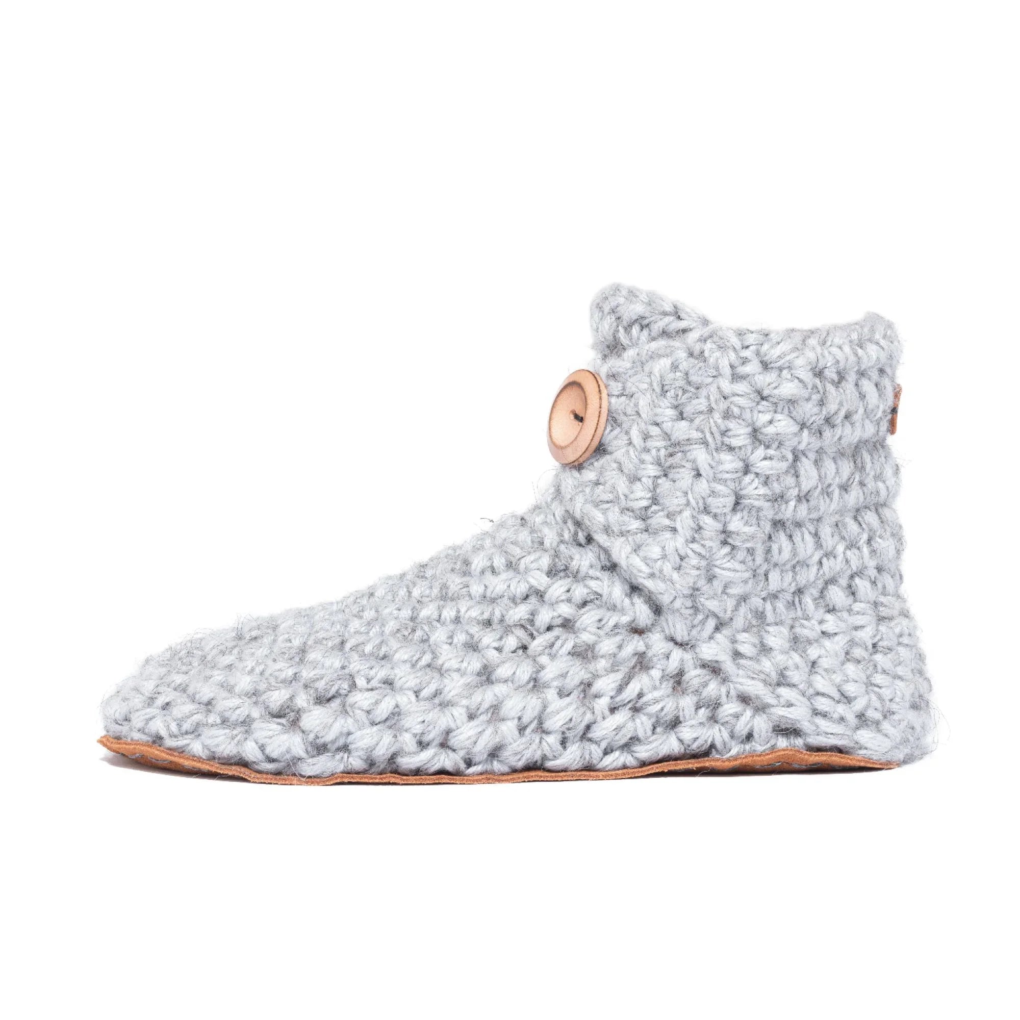 Light gray crocheted slipper boot by Kingdom of Wow on a white background
