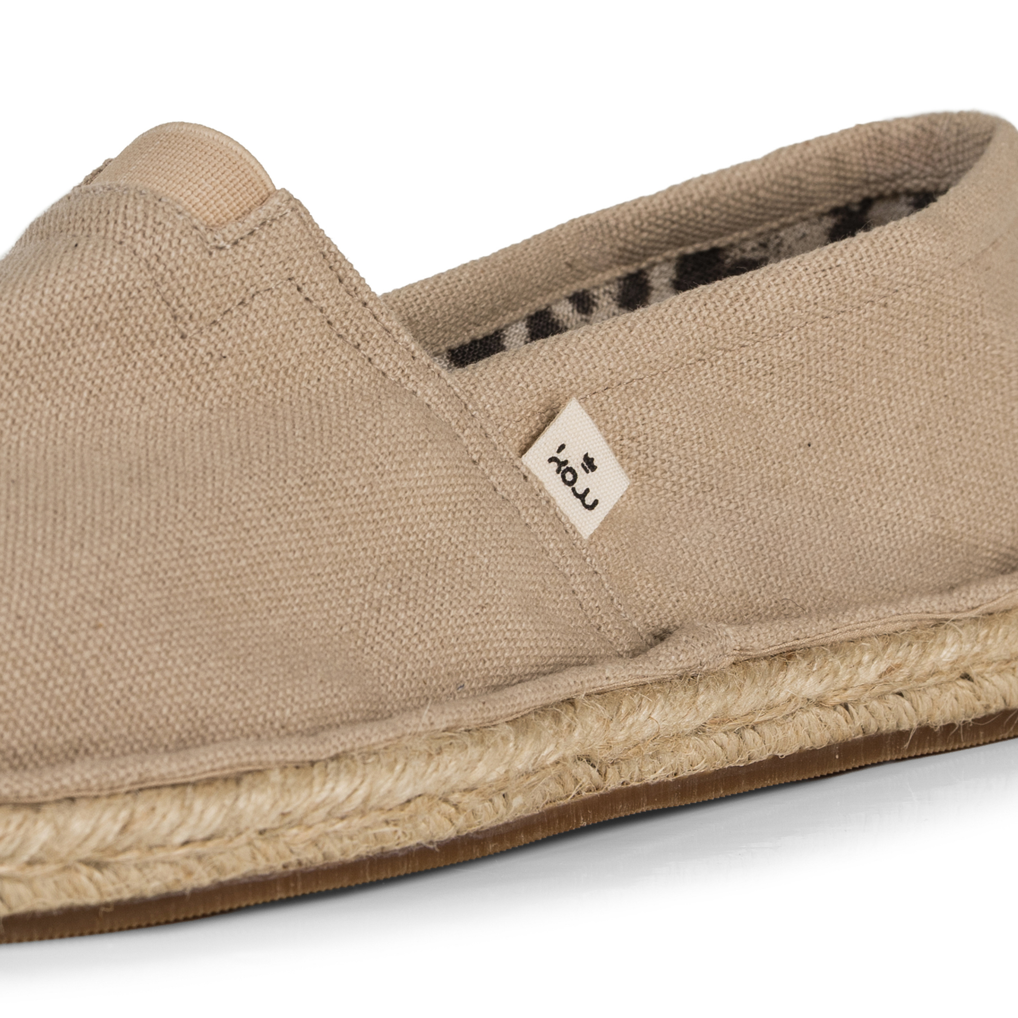 Beige espadrille shoe with KOW brand logo on a white background