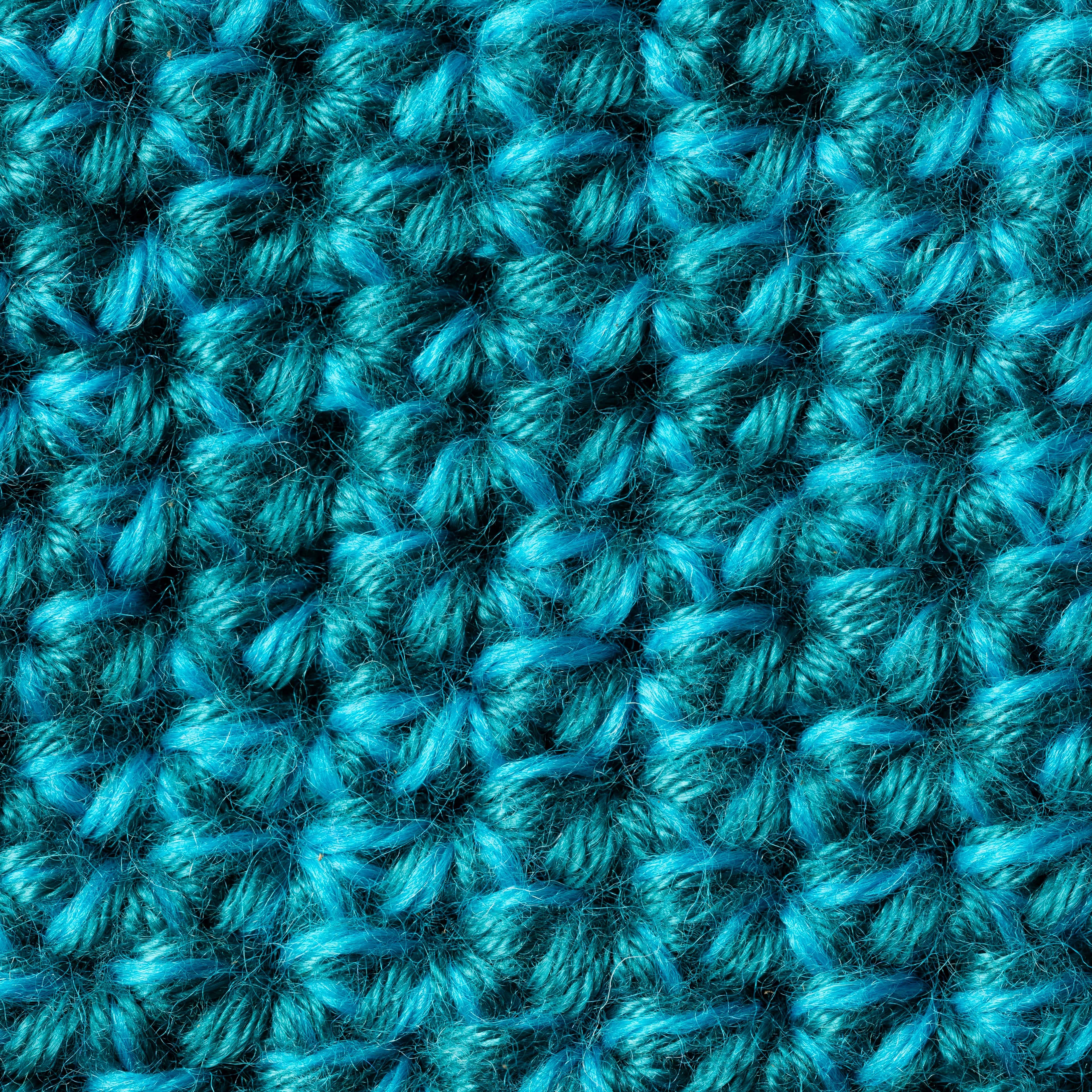 Zoom in of Glacier Teal Wool Crocheted Material