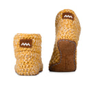 Floris x KOW slippers. A pair of Butterscotch yellow knit slippers with leather soles on a white background