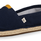 Navy blue espadrille shoe with KOW brand logo on a white background