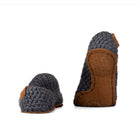 Dark gray light slippers made from two strands of wool by Kingdom of Wow. Leather soles. Back view