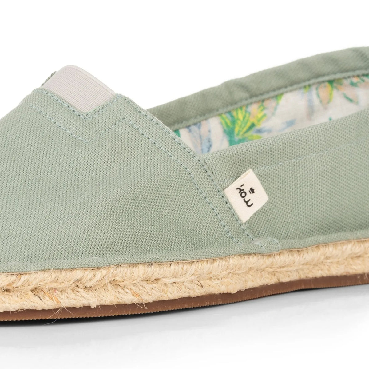 Handmade espadrilles for women in pale green cotton canvas_close up