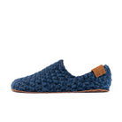 Blue crocheted slipper with leather sole on a white background