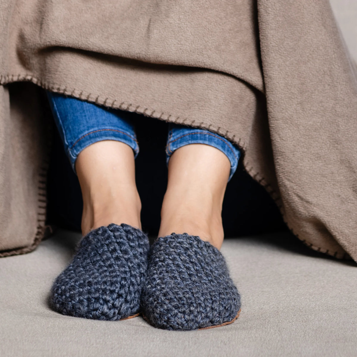 Men wearing light wool slippers by KOW