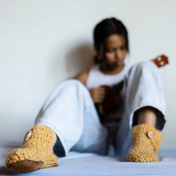 Girl wearing Butterscotch Yellow High Top Wool Bamboo Slippers by Kingdom of Wow